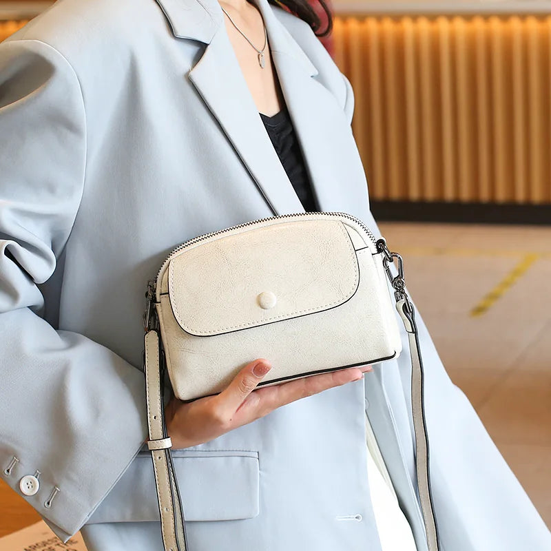 LIVIA MINI LEATHER CROSSBODY BAG