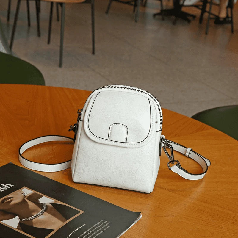 MIRA LEATHER MINI CROSSBODY BAG